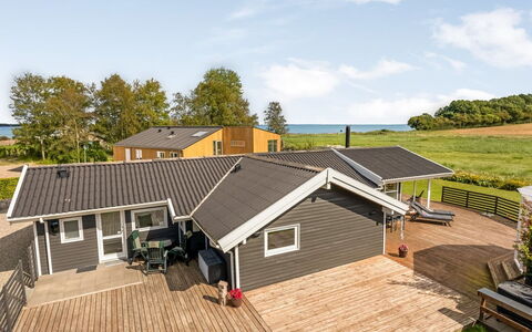 Eisa - 75M from the Sea: House, Home, Roof, Cottage, Estate, Porch, Hardwood, Shade, Plank, Deck