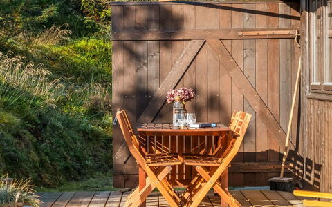Anneka - 750M from the Sea: Wood, Furniture, Hardwood, Outdoor Furniture, Wood Stain, Plank, Wood Flooring, Deck, Outdoor Table, Chair