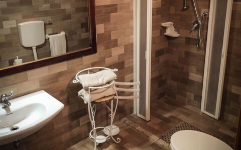 Agriturismo Arcera Apartments: Flooring, Floor, Interior Design, Wood, Furniture, Room, Plumbing Fixture, Lighting, Bathroom, Wood Flooring