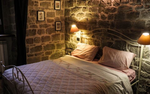 Agriturismo Arcera Apartments: Bedroom, Interior Design, Lighting, Bed, Furniture, Floor, Light Fixture, Bed Sheet, Bedding, Ceiling