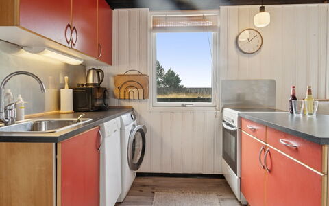 Joon - 100M from the Sea: Washing Machine, Major Appliance, Clothes Dryer, Laundry Room, Kitchen, Kitchen Appliance, Countertop, Home Appliance, Tap, Cabinetry