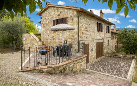 Oliveto del Cantarello: Wall, Door, Cottage, Home, Stone Wall, Brick, Gate, Fence, Estate, Flagstone