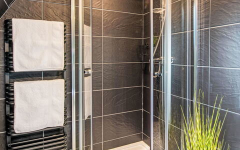 Pine Needle Lodge: Flooring, Floor, Interior Design, Plumbing Fixture, Door, Tile, Bathroom, Plumbing, Shower Door