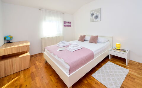 Marija: Bed, Interior Design, Bedroom, Furniture, Bed Sheet, Floor, Bedding, Room, Flooring, Textile