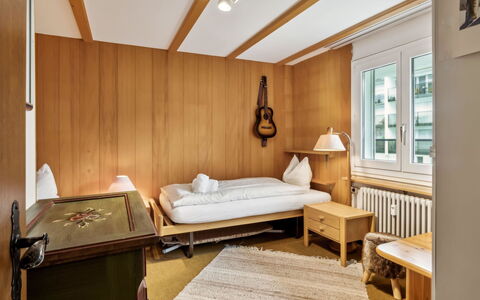 Nr.63 Haus Ladina: Furniture, Interior Design, Flooring, Floor, Wood, Bedroom, Bed, Ceiling, Room, Lighting