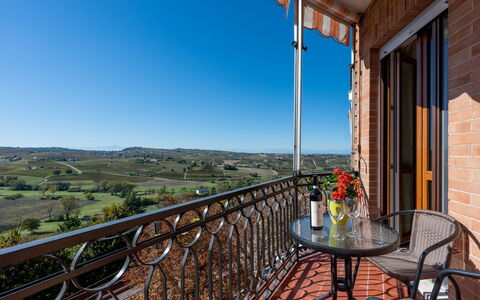 Casa Riggi: Chair, Balcony, Outdoor Furniture, Outdoor Table, Fence