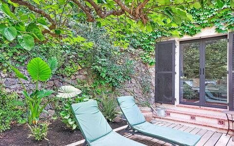 Villa 50: Green, Outdoor Furniture, Shrub, Garden, Shade, Groundcover, Backyard, Yard, Chair
