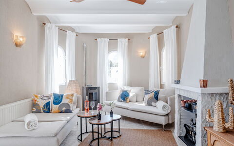 Olivia: Furniture, Interior Design, Wall, Couch, Flooring, Floor, Room, Living Room, Ceiling, Apartment