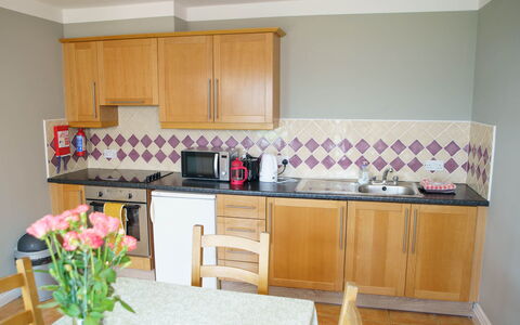 Dingle Cy (Tr4) - 3 Bed No 12: Kitchen, Kitchen Appliance, Furniture, Major Appliance, Countertop, Interior Design, Flooring, Wood, Cabinetry, Kitchen Sink