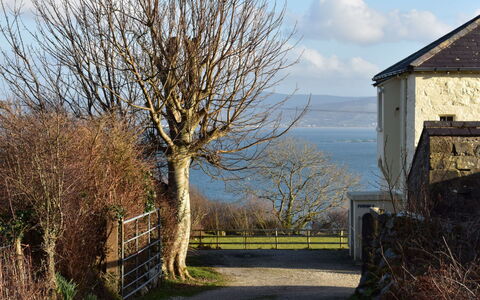 Capstan Cottage Portsalon: Chair, Outdoor Furniture, Yard, Balcony, Larch, Villa, Pine Family, Eco Hotel