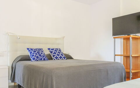 Sol Pins Tamariu: Furniture, Bed, Interior Design, Bedroom, Flooring, Floor, Bedding, Bed Sheet, Wood, Room
