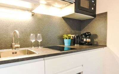 Urban & Florian 100.6: Kitchen, Countertop, Interior Design, Plumbing Fixture, Kitchen Appliance, Tap, Sink, Major Appliance, Kitchen Sink, Home Appliance
