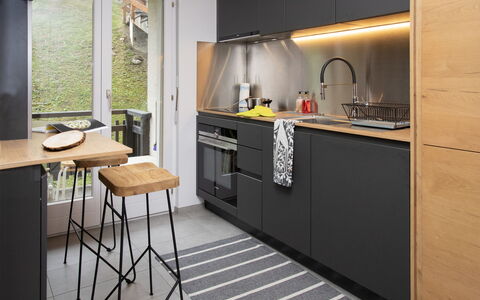 Soleil des Alpes: Kitchen, Kitchen Appliance, Countertop, Furniture, Interior Design, Major Appliance, Wood, Flooring, Cabinetry, Home Appliance