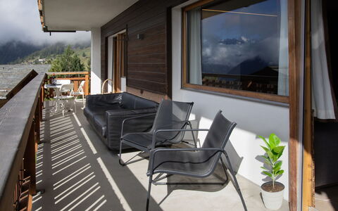 Soleil des Alpes: Wood, Porch, Balcony, Home, Mountain Range, Hardwood, Chair, Wood Stain, Ridge, Shade