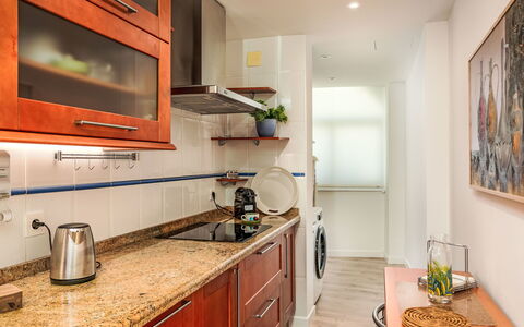 Urban Nest Estepona: Kitchen, Countertop, Kitchen Appliance, Flooring, Major Appliance, Furniture, Interior Design, Cabinetry, Wood, Floor