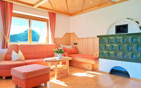 Gernkogel: Interior Design, Flooring, Orange, Living Room, Wood Stain, Varnish, Hardwood, Houseplant, Lamp, Wood Flooring