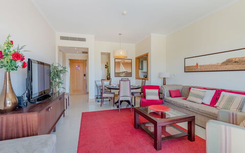 The Residence at Victoria: Flooring, Floor, Furniture, Interior Design, Ceiling, Couch, Living Room, Apartment, Room