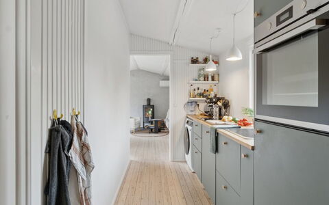 Gun - 300M to the Fjord: Kitchen, Wood, Flooring, Interior Design, Ceiling, Major Appliance, Kitchen Appliance, Countertop, Lighting, Light Fixture