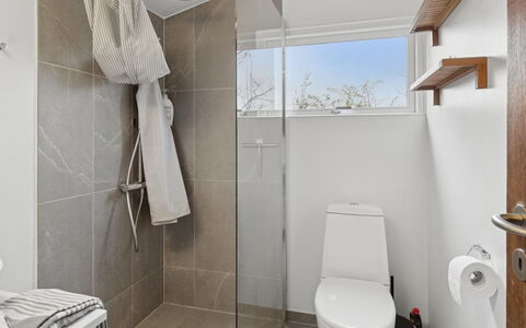 Gun - 300M to the Fjord: Bathroom, Plumbing Fixture, Interior Design, Toilet Seat, Toilet, Wall, Flooring, Floor, Ceiling, Sink
