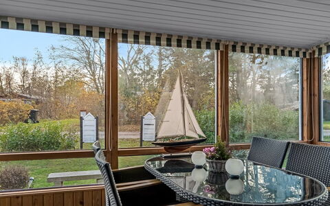 Hakon - 1Km from the Sea: Furniture, Wood, Interior Design, Chair, Shade, Glass, Ceiling, Porch, Eco Hotel, Kitchen & Dining Room Table