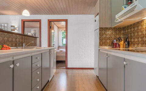 Wenche - 840M from the Sea: Countertop, Interior Design, Kitchen, Flooring, Wood, Cabinetry, Ceiling, Light Fixture, Floor, Furniture