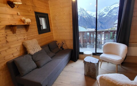 Balcons de Venosc: Wood, Furniture, Wood Stain, Hardwood, Chair, Wood Flooring, Living Room, Log Cabin, Plywood, Plank