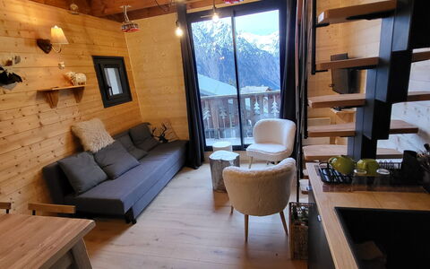 Balcons de Venosc: Wood, Furniture, Flooring, Floor, Interior Design, Room, Wood Stain, Hardwood, Living Room, Wood Flooring