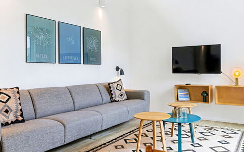 Favola: Furniture, Interior Design, Flooring, Wall, Couch, Living Room, Floor, Wood, Table, Room