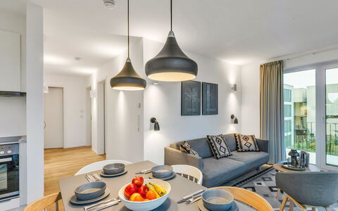 Seezauber: Interior Design, Flooring, Ceiling, Floor, Furniture, Room, Apartment, Chair, Living Room, Light Fixture