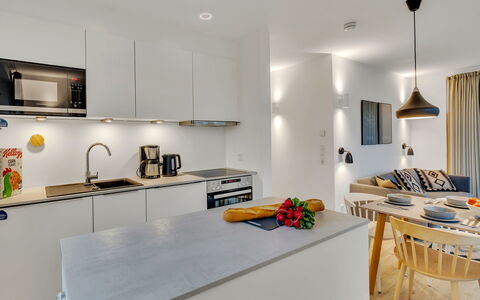 Seezauber: Kitchen, Interior Design, Furniture, Countertop, Flooring, Wall, Light Fixture, Ceiling, Kitchen Appliance, Room