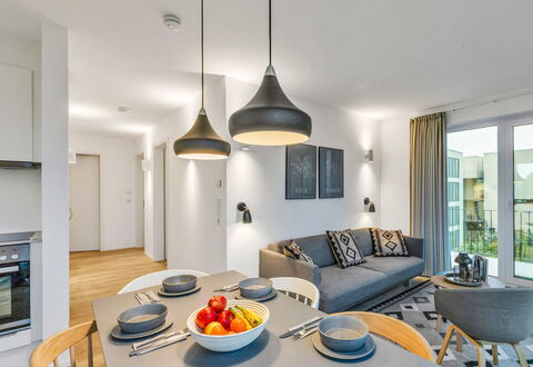 Seezauber: Interior Design, Flooring, Ceiling, Floor, Furniture, Room, Apartment, Chair, Living Room, Light Fixture