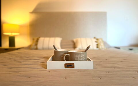 Côté Bassin: Bed, Bedroom, Furniture, Bedding, Bed Sheet, Linens, Textile, Lighting, Throw Pillow, Interior Design