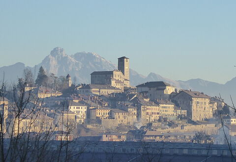 Casa Ines, Feltre: Building, Wall, Town, Roof, Human Settlement, Urban Design, Morning, Hill Station, Tower, Village