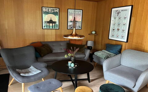 Sheyla - 70M from the Sea: Furniture, Flooring, Floor, Interior Design, Living Room, Chair, Wood Flooring, Coffee Table, Room, Wood Stain