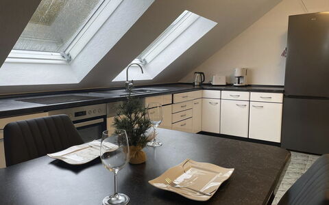 Naturnah mit Pool und Sauna: Interior Design, Furniture, Flooring, Kitchen, Ceiling, Floor, Lighting, Attic, Countertop, Chair