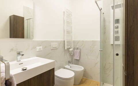 Lotus: Flooring, Floor, Bathroom, Interior Design, Plumbing Fixture, Wall, Toilet, Toilet Seat, Wood, Bathroom Sink