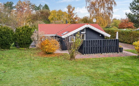 Gyda - 840M from the Sea: House, Roof, Shrub, Cottage, Home, Siding, Garden, Lawn, Garden Buildings, Backyard