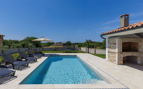 Damir: Swimming Pool, Blue, Architecture, Composite Material, Resort, Tile, Estate, Water Feature, Flagstone, Outdoor Furniture