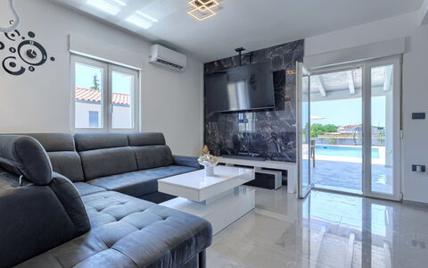 Damir: Furniture, Interior Design, Flooring, Couch, Floor, Living Room, Ceiling, Table, Lighting, Apartment