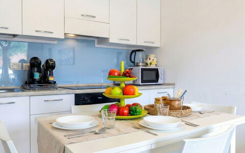 Spritz Home: Furniture, Kitchen, Kitchen Appliance, Interior Design, Countertop, Major Appliance, Wood, Flooring, Cabinetry, Tableware