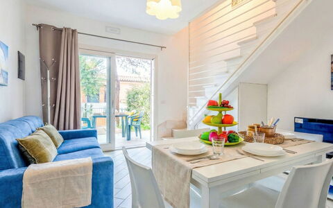 Spritz Home: Flooring, Floor, Apartment, Chair, Houseplant, Wood Stain, Kitchen & Dining Room Table, Tile, Balcony, Hotel