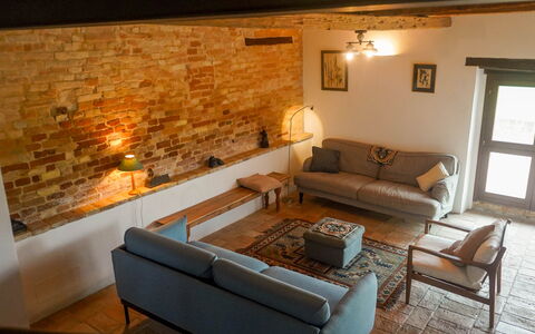 Villa la Dolcevita: Furniture, Interior Design, Wall, Flooring, Couch, Wood, Ceiling, Floor, Living Room, Room