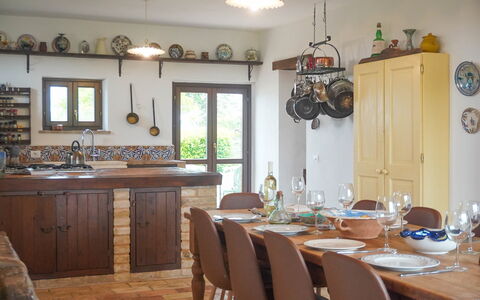 Villa la Dolcevita: Furniture, Interior Design, Kitchen, Wood, Flooring, Table, Kitchen & Dining Room Table, Chair, Light Fixture, Room