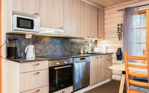 Villa Saimaa: Wood, Furniture, Flooring, Sink, Kitchen, Wood Stain, Countertop, Major Appliance, Tap, Plumbing Fixture