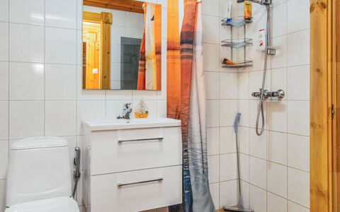 Villa Saimaa: Flooring, Plumbing Fixture, Floor, Interior Design, Bathroom, Plumbing, Sink, Room, Bathroom Cabinet, Bathroom Sink