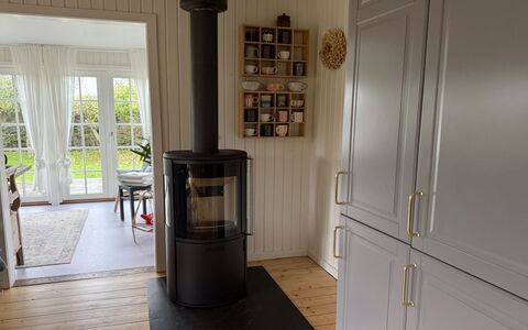 Yvette - 350M from the Sea: Wood Flooring, Hardwood, Wood Stain, Chair, Laminate Flooring, Living Room, Wood-Burning Stove, Houseplant, Kitchen & Dining Room Table, Plank