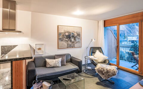 Chesa Promulins: Interior Design, Wall, Flooring, Wood, Ceiling, Furniture, Floor, Room, Lighting, Apartment