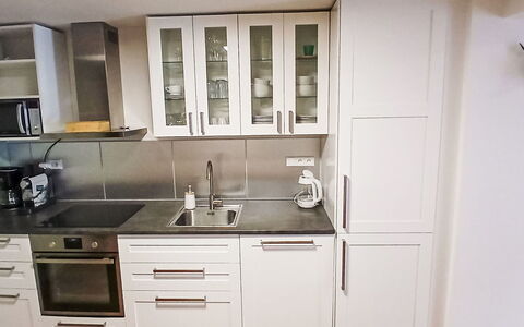 Na Kovárně: Cabinetry, Countertop, Kitchen, Flooring, Wood, Kitchen Appliance, Furniture, Interior Design, Cupboard, Home