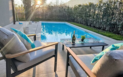 Villa Malia Private Pool: Furniture, Swimming Pool, Outdoor Furniture, Chair, Resort, Flooring, Floor, Outdoor Table, Shade