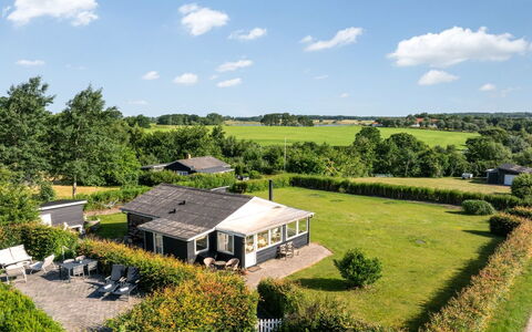 Hjalma - 250M to the Fjord: Grass, House, Roof, Home, Residential Area, Landscape, Cottage, Shrub, Plain